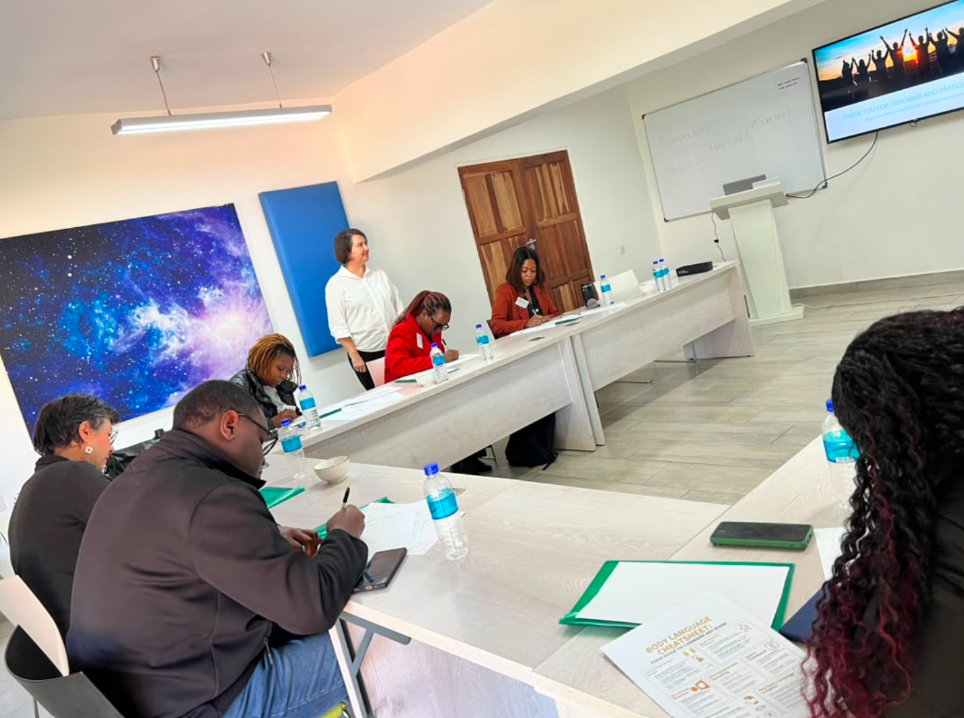Marina Ramlaul presenting to participants in the training room
